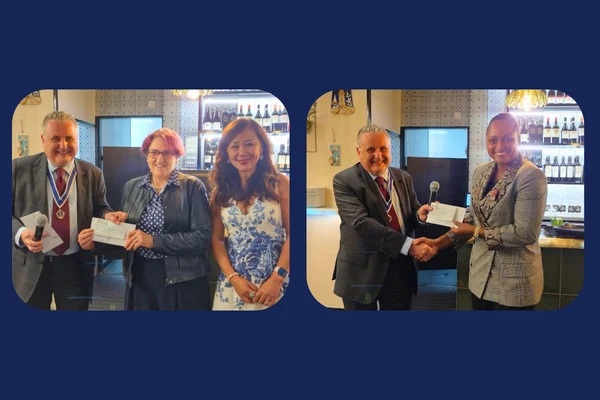 Former Mayor Noel Hadjimichael presents cheques to representatives of his two chosen charities at the Retiring Mayor's Dinner